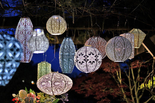 Lumiz solar lanterns lit up at dusk, available at Villarosa Maison NZ