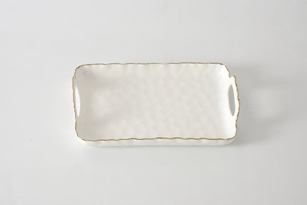 Rectangular ceramic tray with handles on a light gray background